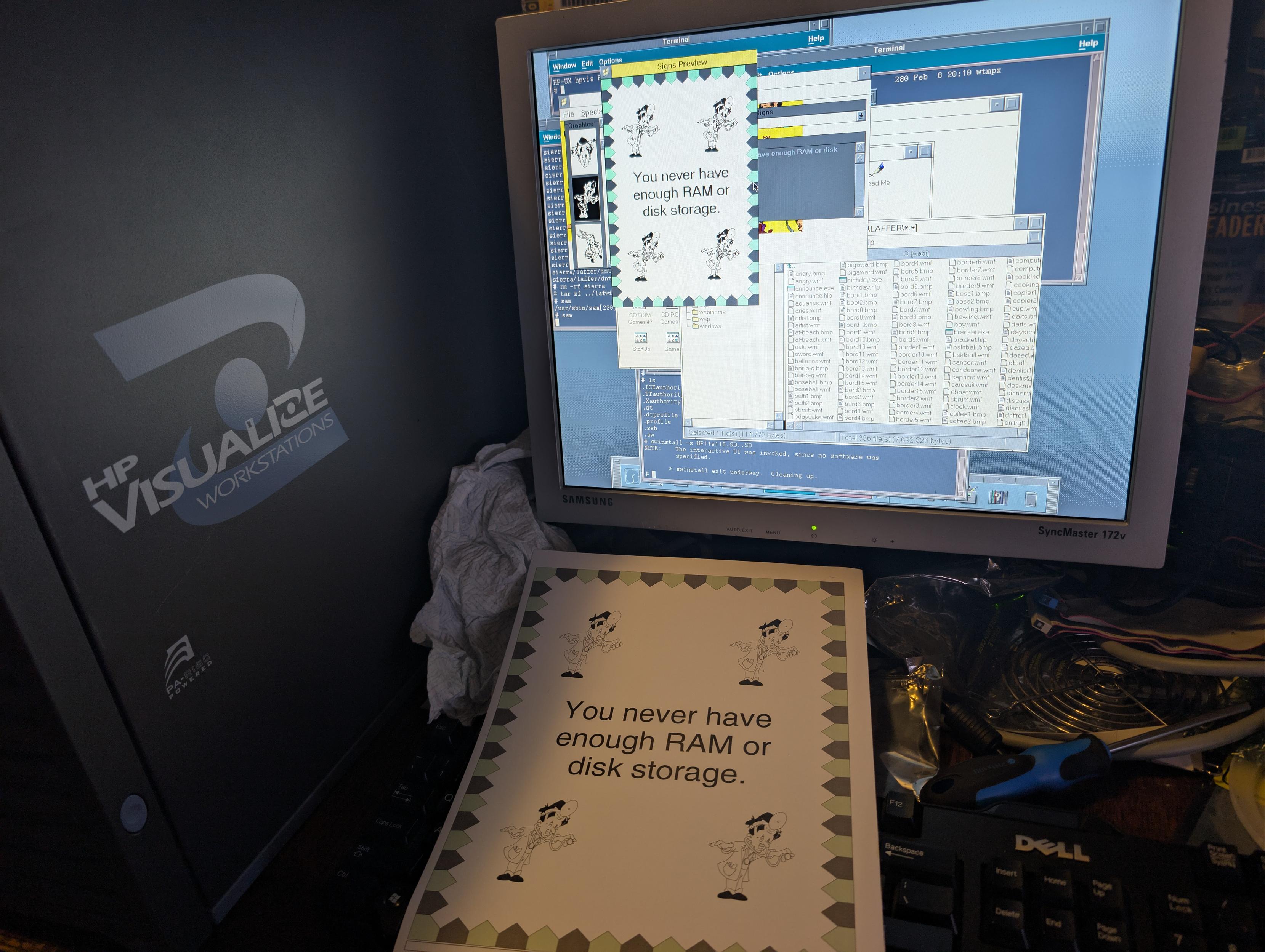 A photo of a HP B2000 workstation running the laffer utilities. On the keyboard is a printout of a sign generated with the sign creator.